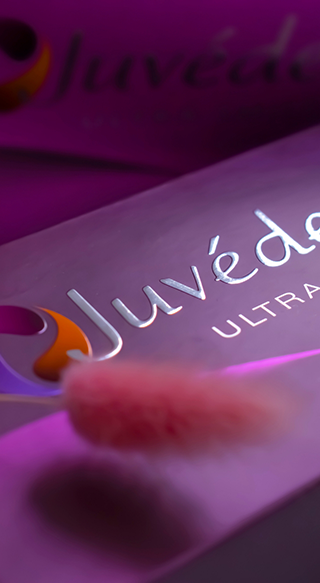 Close up of Juvederm logo