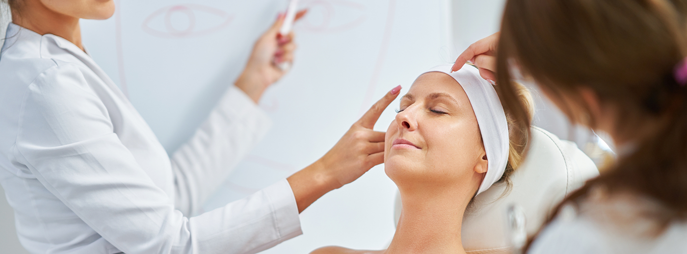 Patient being treated by esthetic experts